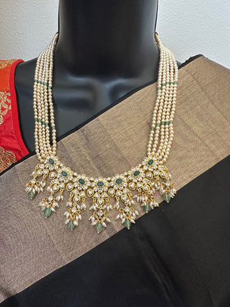 Original Swarovski pearls with emerald beads with cz stones pendant with matching earrings