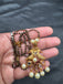 Simple antique peacock design with uncut stones and pearls black beads chain