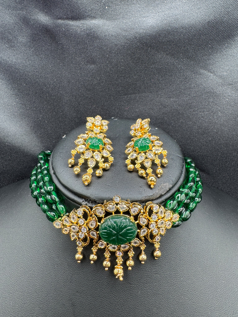 Elegant cz stones and emerald stones pendant set with a matching emerald bead chain