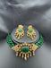 Elegant cz stones and emerald stones pendant set with a matching emerald bead chain