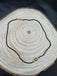 Single line black diamond bead with small gold ball and pearls