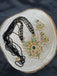 CZ stones and Emerald stones pendant with a bunch of black diamond beads necklace