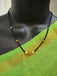Single line black diamond bead with small gold ball and pearls