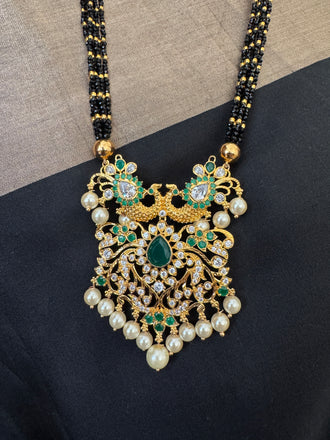 CZ stones and Emerald stones pendant with a bunch of black diamond beads necklace