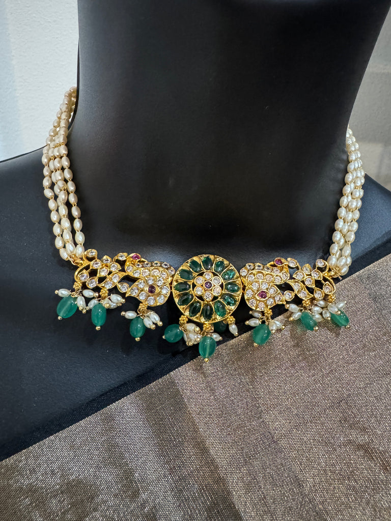 Pearl with CZ stones and emerald pendant & earrings
