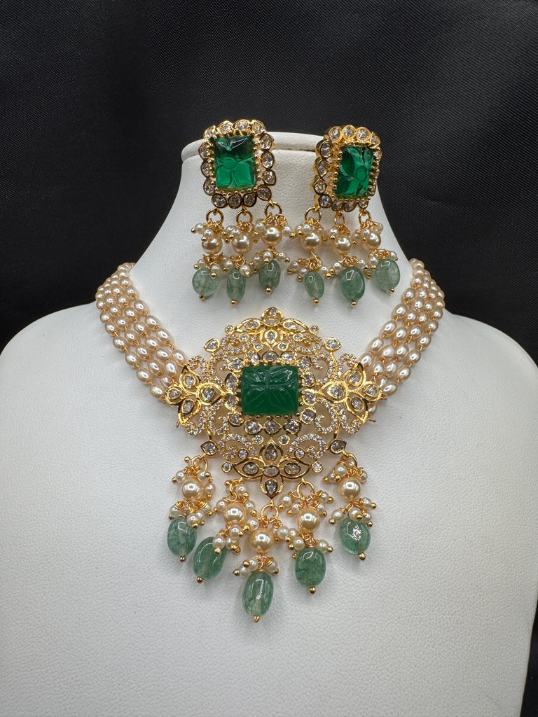 Pearl with CZ stones and emerald pendant & earrings