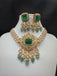 Pearl with CZ stones and emerald pendant & earrings
