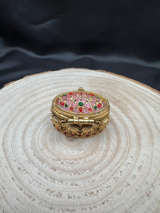 Beautiful multicolor Stones kumkum & Turmeric box
Handmade jewelry