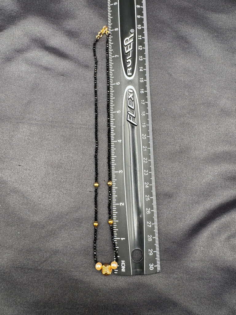 Single line black diamond bead with small gold ball and pearls
