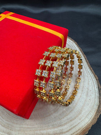 CZ stones flower design set of 4 bangles
