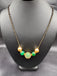 Green stone ball and Swarovski pearls with a single line of black bead chain