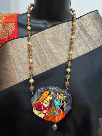 Natural sea Crystal hand-painted Radha & Krishna pendant with multicolored beads netted chain