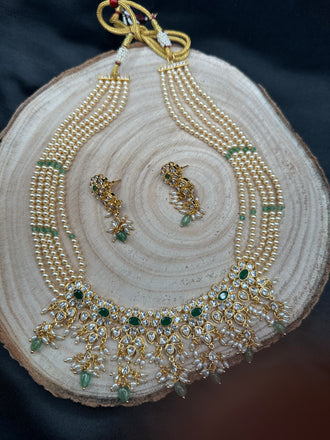 Original Swarovski pearls with emerald beads with cz stones pendant with matching earrings