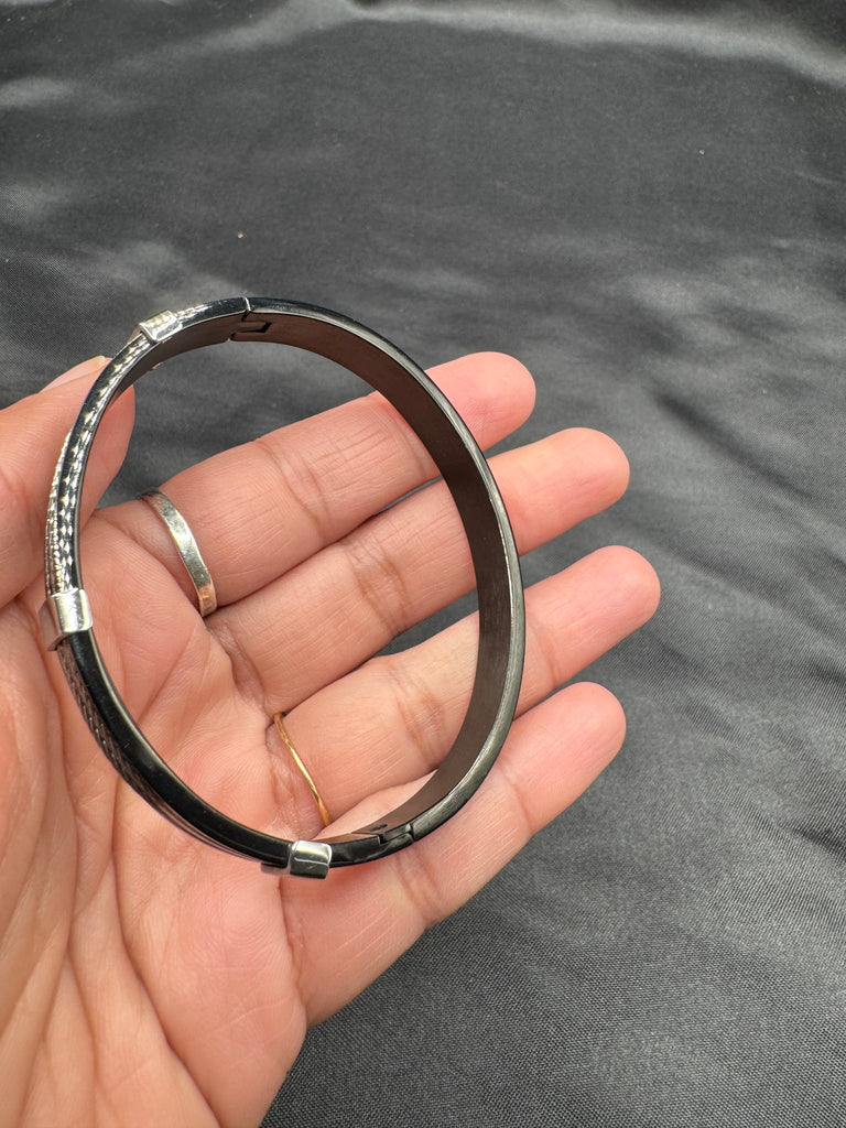 Black metal with silver wire bangle type bracelet