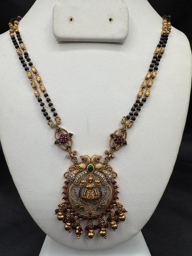 Traditional look antique Lakshmi pendant with black beads chain