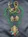 Long three-line Emerald bead chain with Navrathana Stones Venkateshwara Swamy pendant with matching earrings