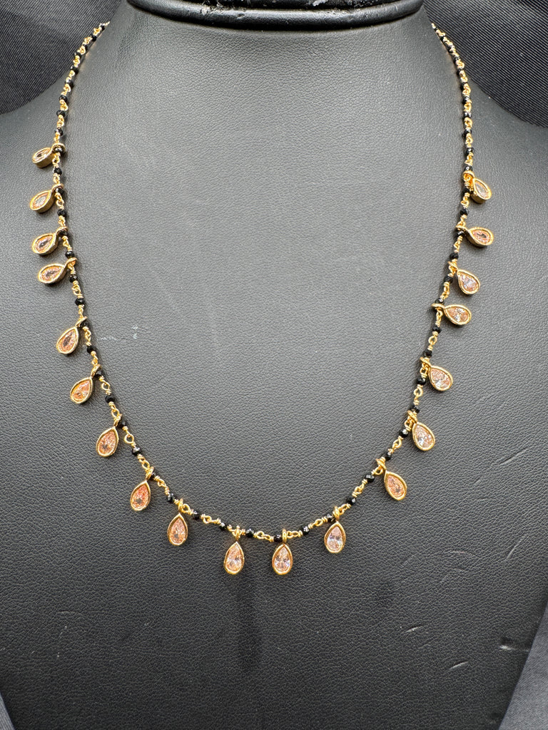 Black diamond beads with cz stones hanging