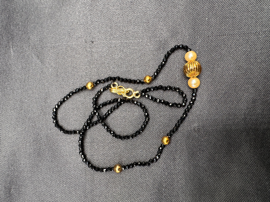 Single line black diamond bead with small gold ball and pearls
