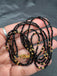 Double line black diamond beads with a gold bead chain