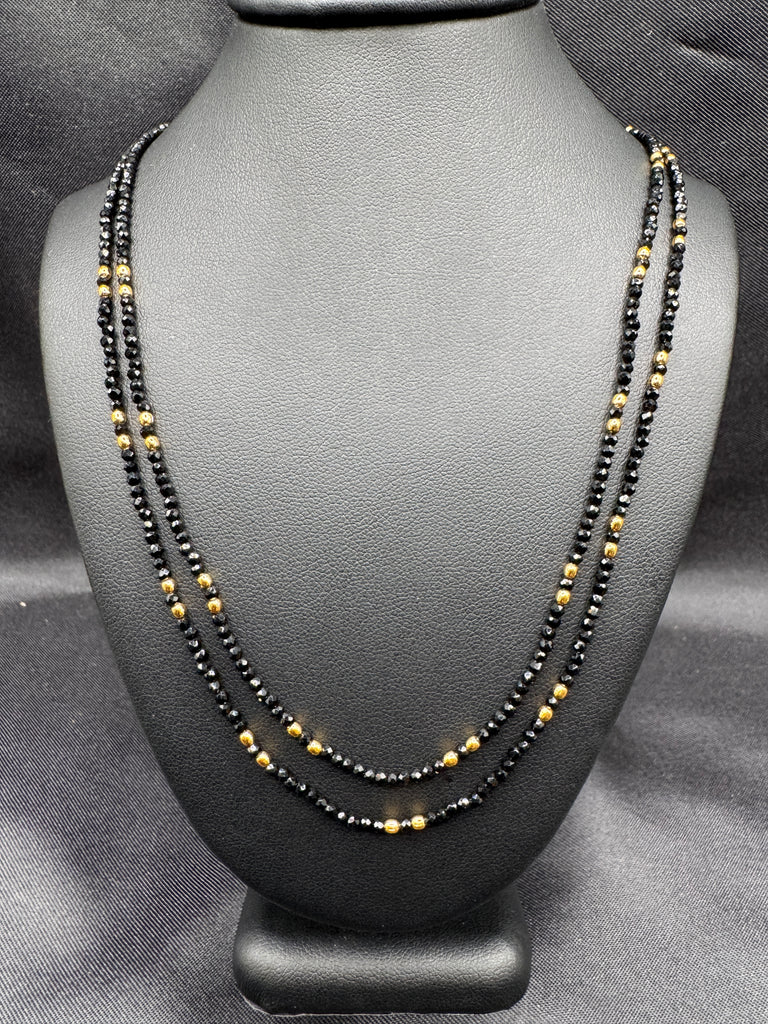 Double line black diamond beads with a gold bead chain