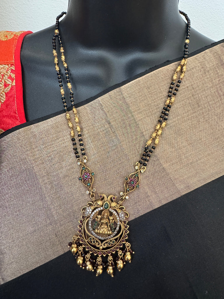 Traditional look antique Lakshmi pendant with black beads chain