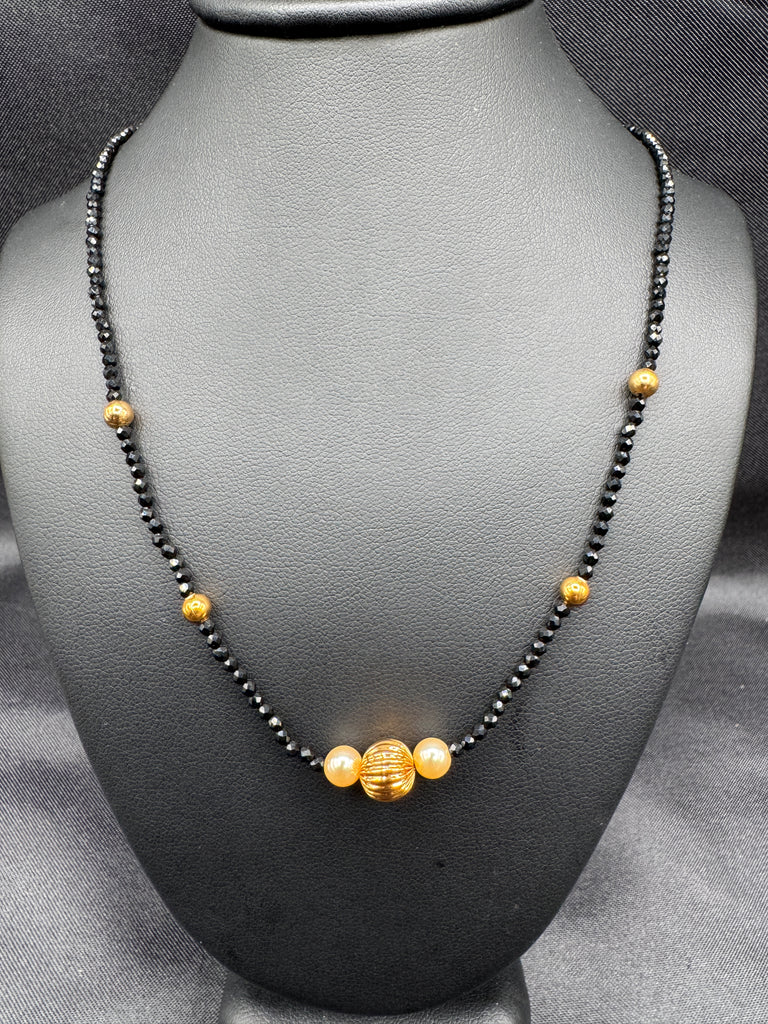 Single line black diamond bead with small gold ball and pearls