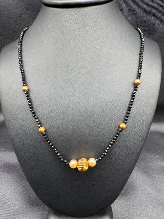 Single line black diamond bead with small gold ball and pearls