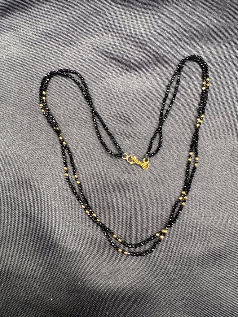 Double line black diamond beads with a gold bead chain