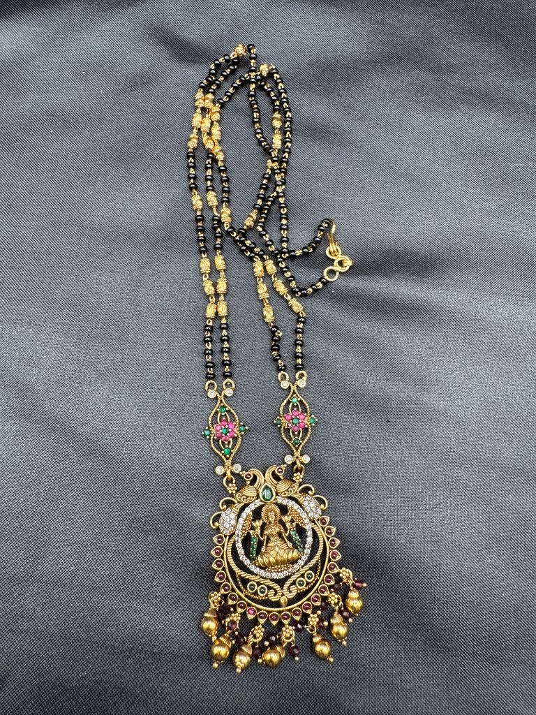 Traditional look antique Lakshmi pendant with black beads chain