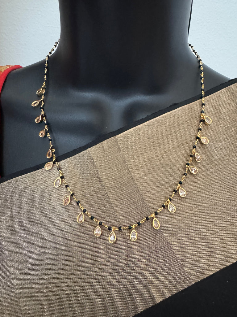 Black diamond beads with cz stones hanging