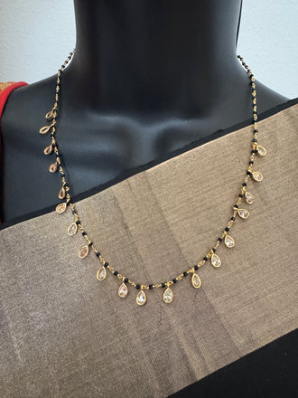 Black diamond beads with cz stones hanging