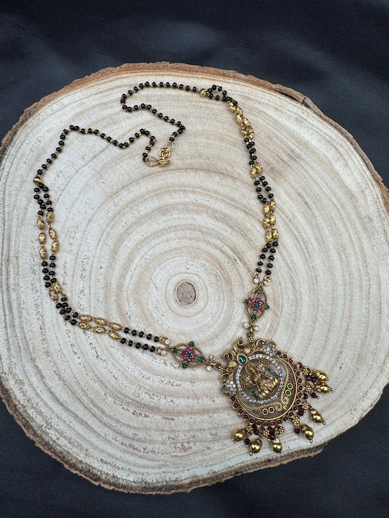 Traditional look antique Lakshmi pendant with black beads chain