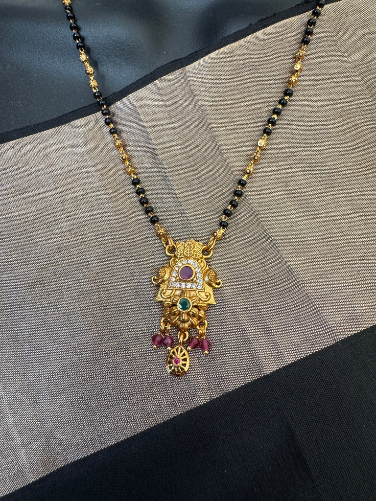 Beautiful and traditional look multicolor Stones pendant with a black bead chain