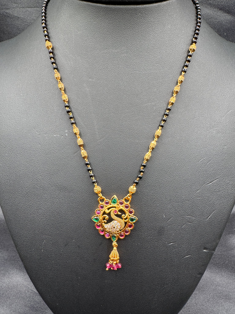 Traditional look peacock design pendant with a black bead chain
