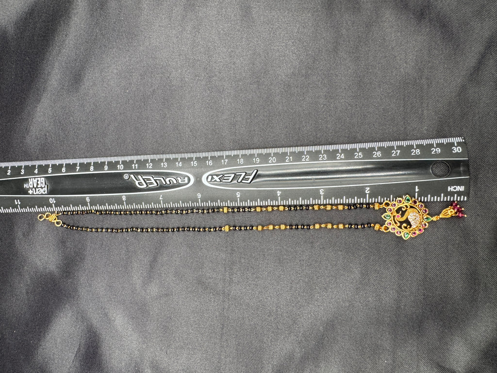 Traditional look peacock design pendant with a black bead chain