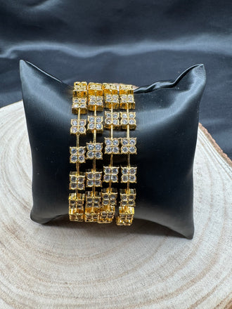 CZ stones flower design set of 4 bangles