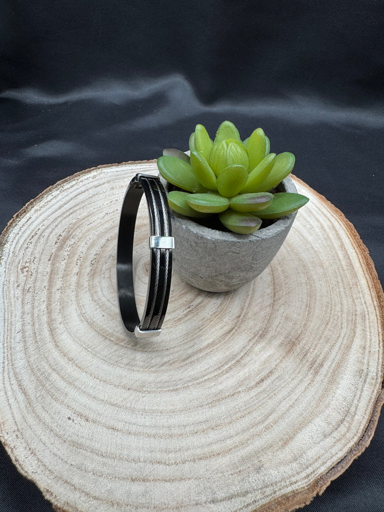 Black metal with silver wire bangle type bracelet
