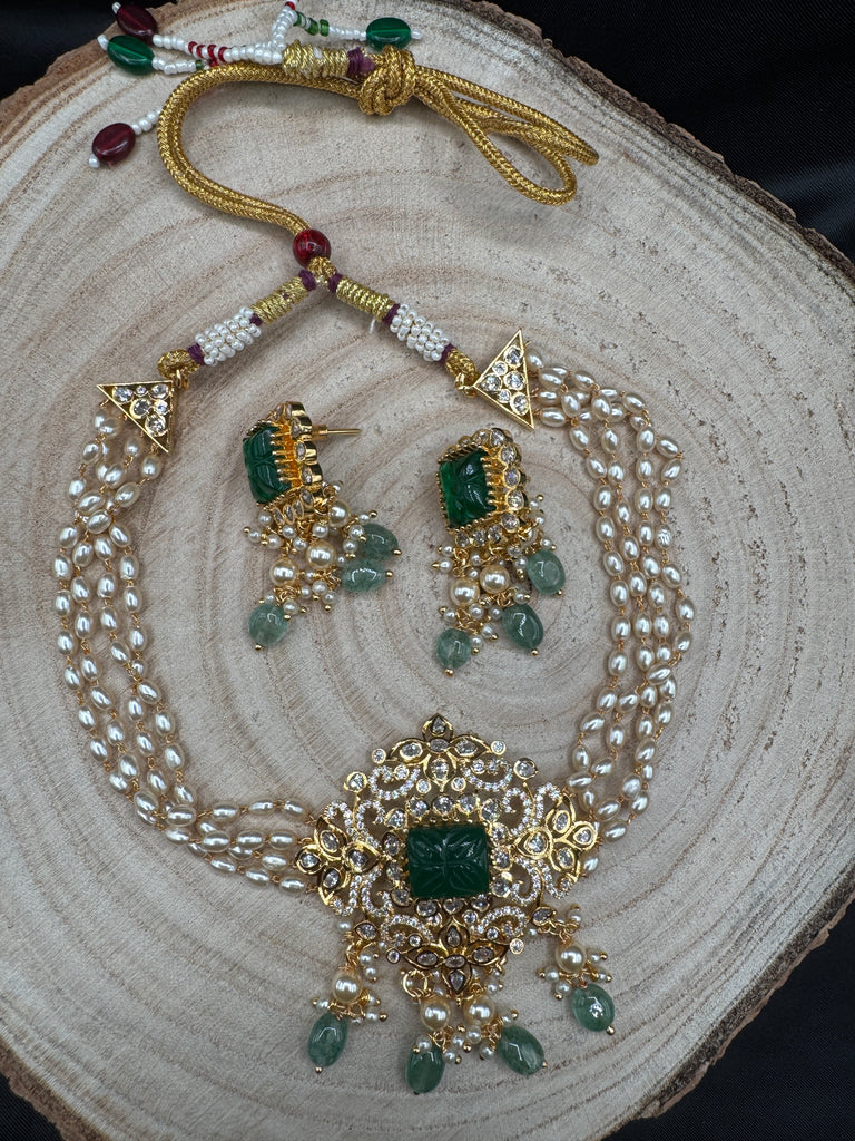 Pearl with CZ stones and emerald pendant & earrings