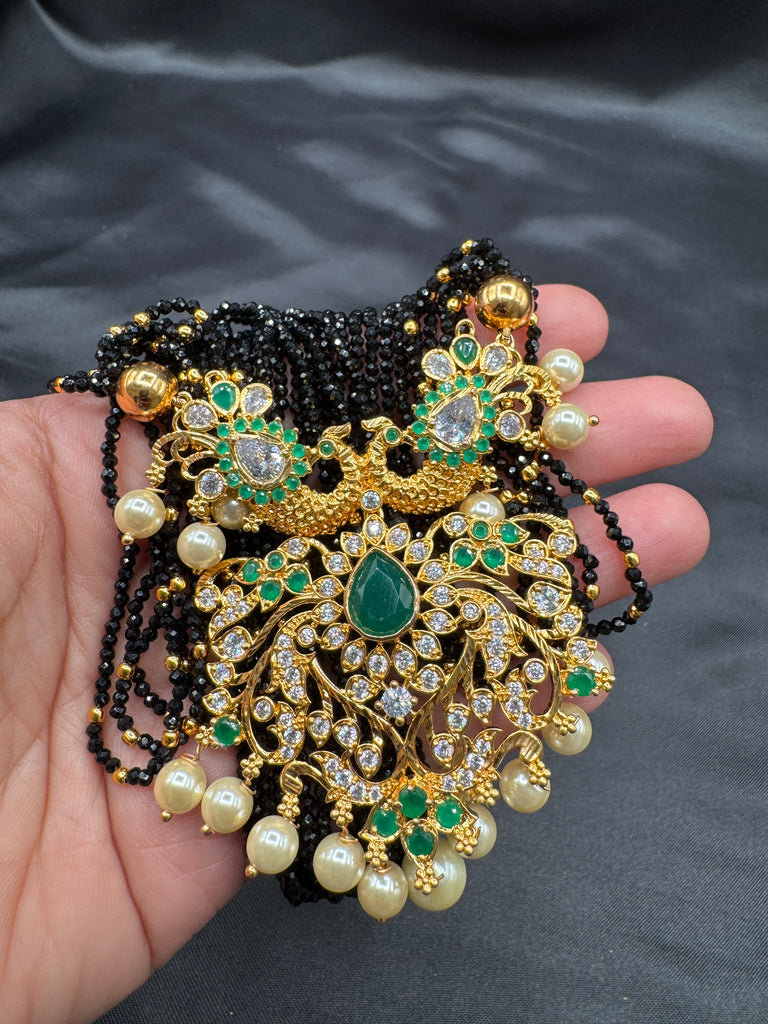 CZ stones and Emerald stones pendant with a bunch of black diamond beads necklace