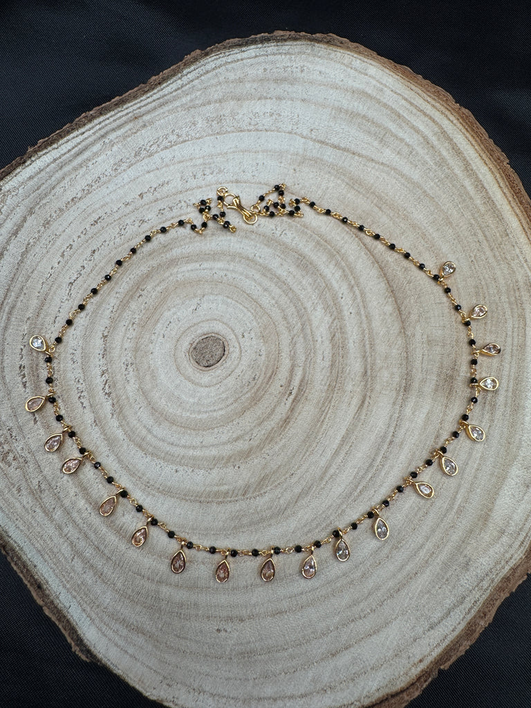 Black diamond beads with cz stones hanging