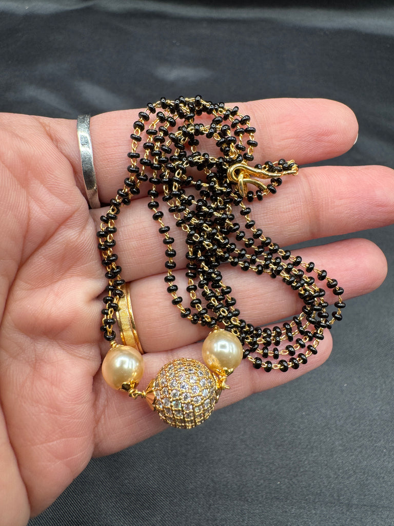 Double line black bead chain with cz stones and a Swarovski ball pendant