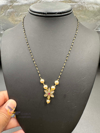 Pearls and Kundan Stones pendant with black beads chain