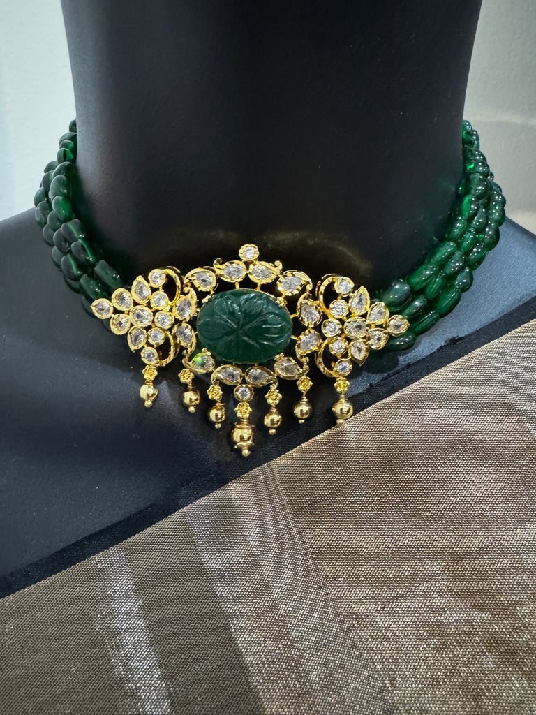 Elegant cz stones and emerald stones pendant set with a matching emerald bead chain