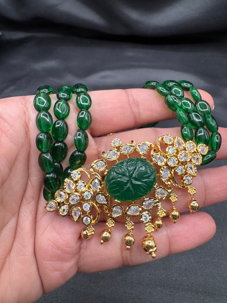 Elegant cz stones and emerald stones pendant set with a matching emerald bead chain