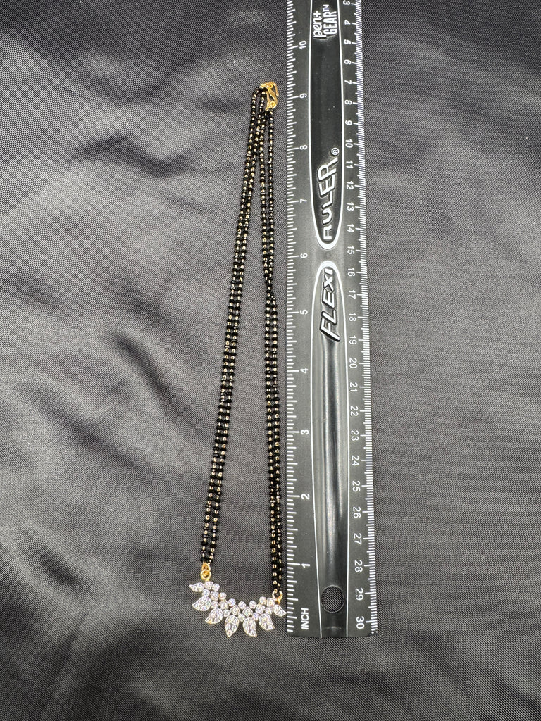 Leaf design cz stones pendant with a double line black beads chain