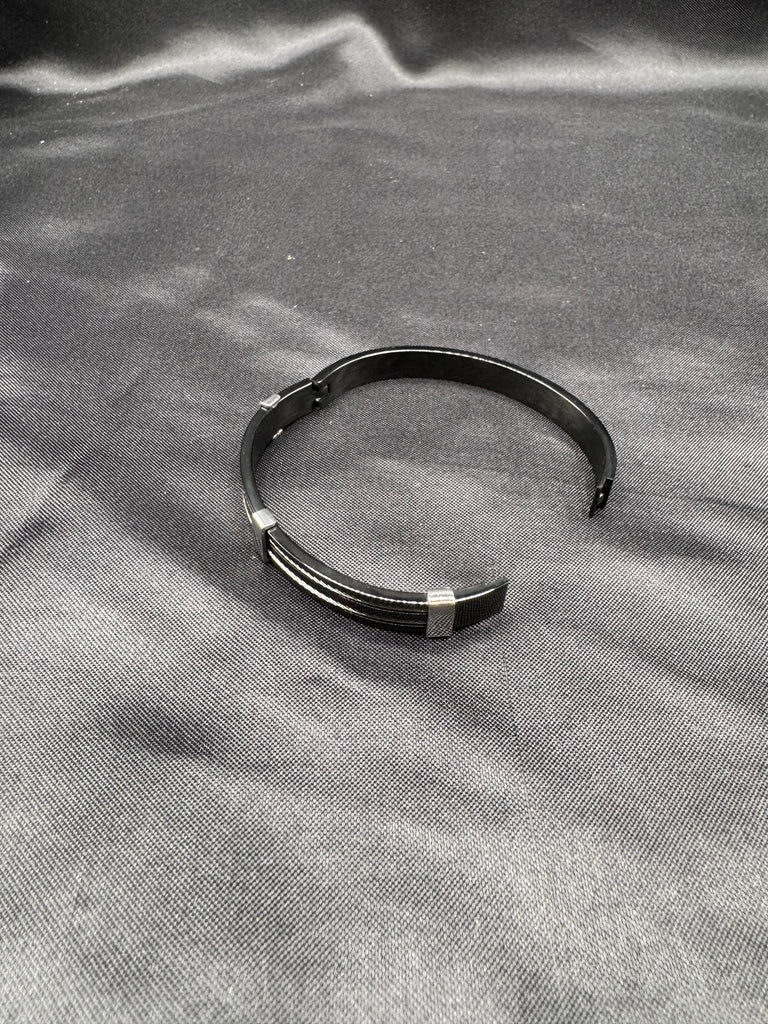 Black metal with silver wire bangle type bracelet
