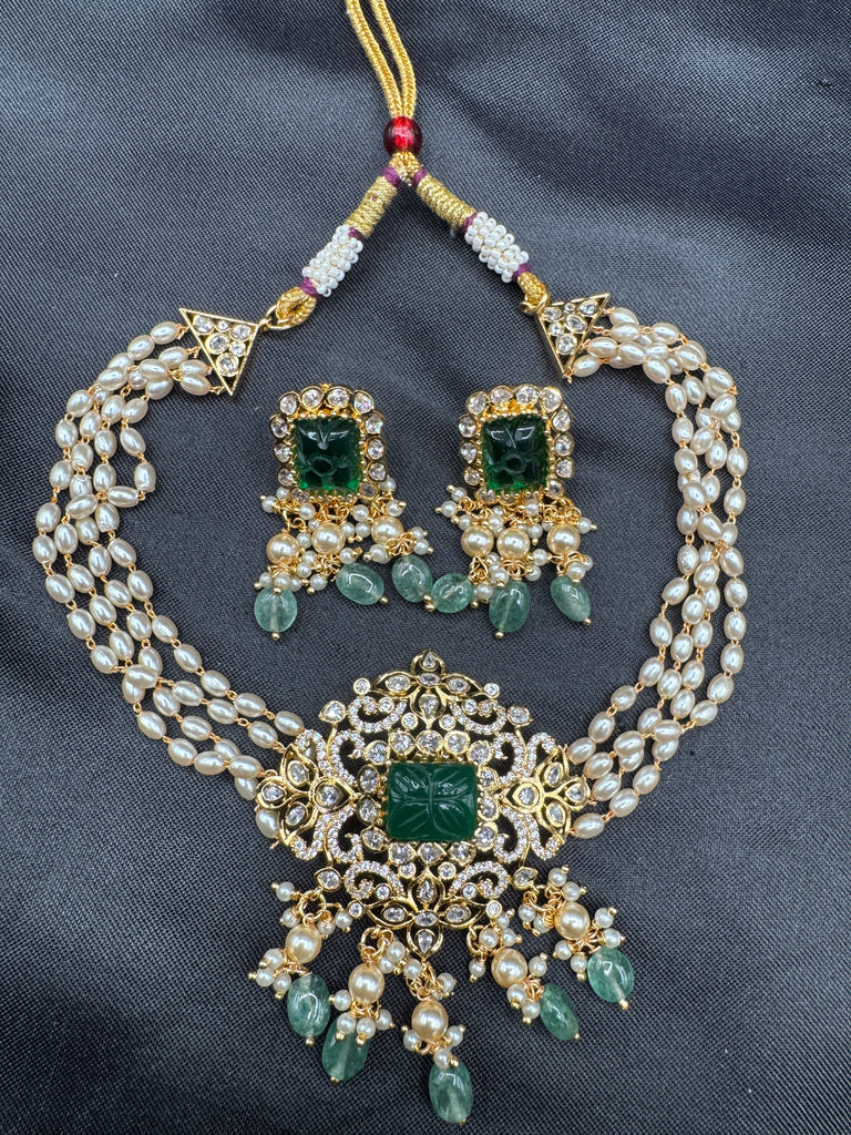 Pearl with CZ stones and emerald pendant & earrings