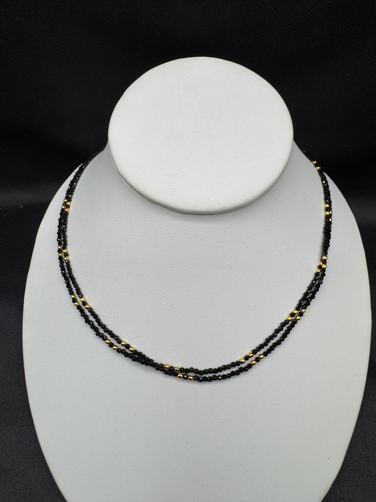 Double line black diamond beads with a gold bead chain