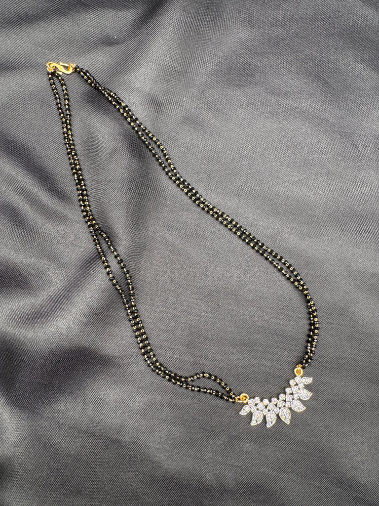 Leaf design cz stones pendant with a double line black beads chain