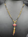 Multicolor Stones ball pendant with a black beads chain